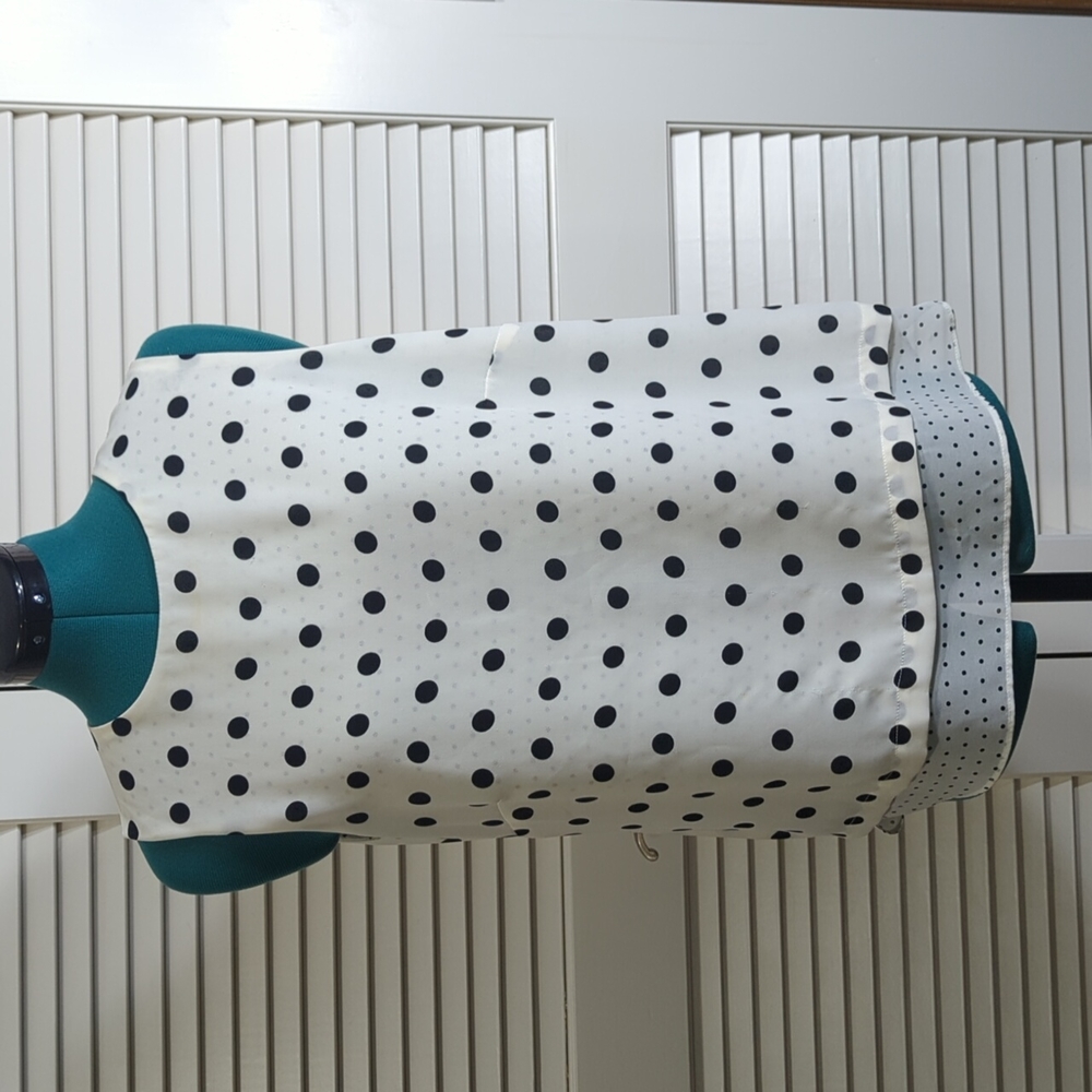 Black and white sleeveless blouse